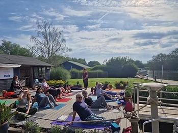 A gentle Saturday morning yoga class on the deck above the River Yare